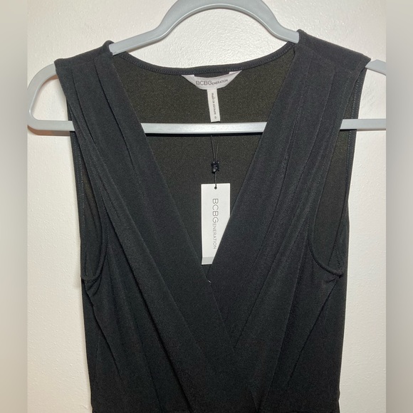 BCBGeneration V-neck Surplice Romper in Black. Size Small. - Picture 6 of 11